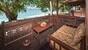 Nordsulawesi - Murex Bangka Resort, Oceanfront Cottage Terrasse (Zimmerbeispiel)