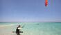 Hurghada - Harry Nass Center, Kiten im kristallklaren Wasser bei Magawish Island