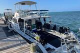 Little Cayman - Little Cayman Beach Resort, Tauchboot