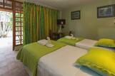 Tobago - Shepherd`s Inn, Zimmerbeispiel Gartenseite/Pasture Room