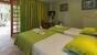 Tobago - Shepherd`s Inn, Zimmerbeispiel Gartenseite/Pasture Room