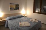 Lo Stagnone - Torre Lupa, Appartement Schlafzimmer